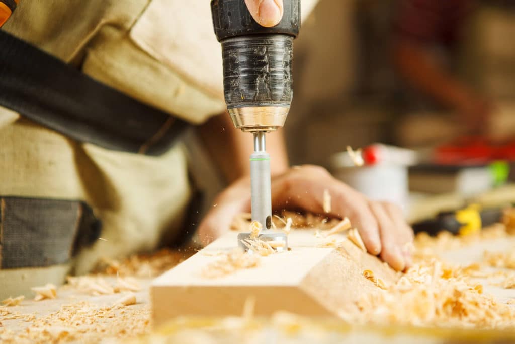 drilling into a piece of wood